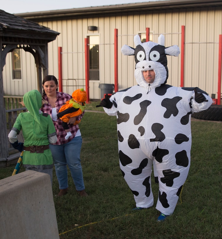 U.S. Marines with U.S. Marine Corps Forces Command and their families participate in the 2018 Harvest Festival at Headquarters & Service Battalion, MARFORCOM, Norfolk, Virginia, October 18. Events included a costume contest, trunk-or-treat for the children, and a performance by The Walker Academy of Irish Dance. (Official U.S. Marine Corps photo by Chris Jones/Released)