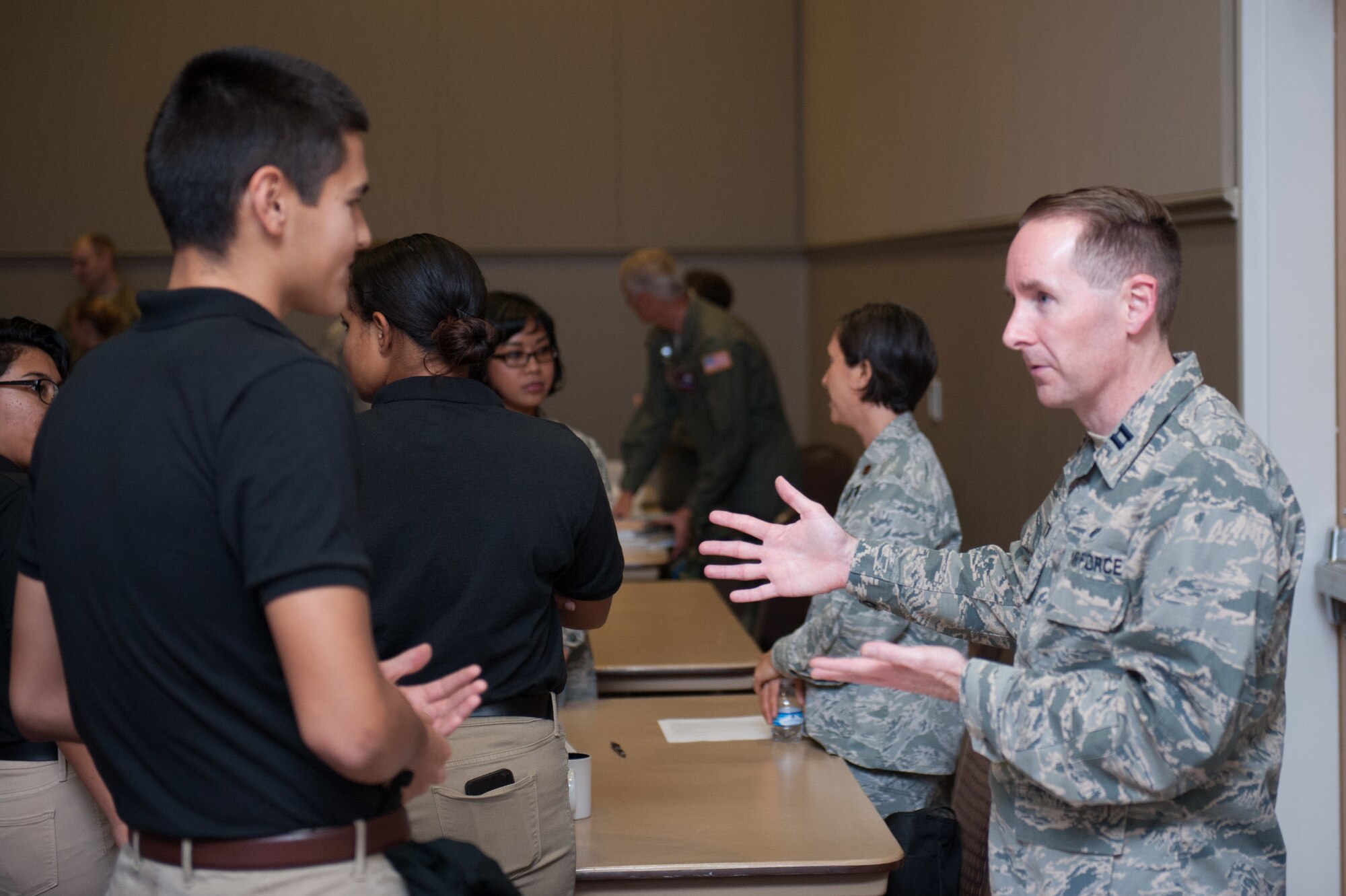 Captain Kevin Batik, 301st Fighter Wing Assistant Staff Judge Advocate, speaks with a Texas Christian University Reserver Officer Training Corps Cadet during the TCU Detachment 845 Career Day, October 18. Reserve Citizen Airmen from Tenth Air Force took part in the event to help cadets learn about the different career opportunities available upon commissioning.