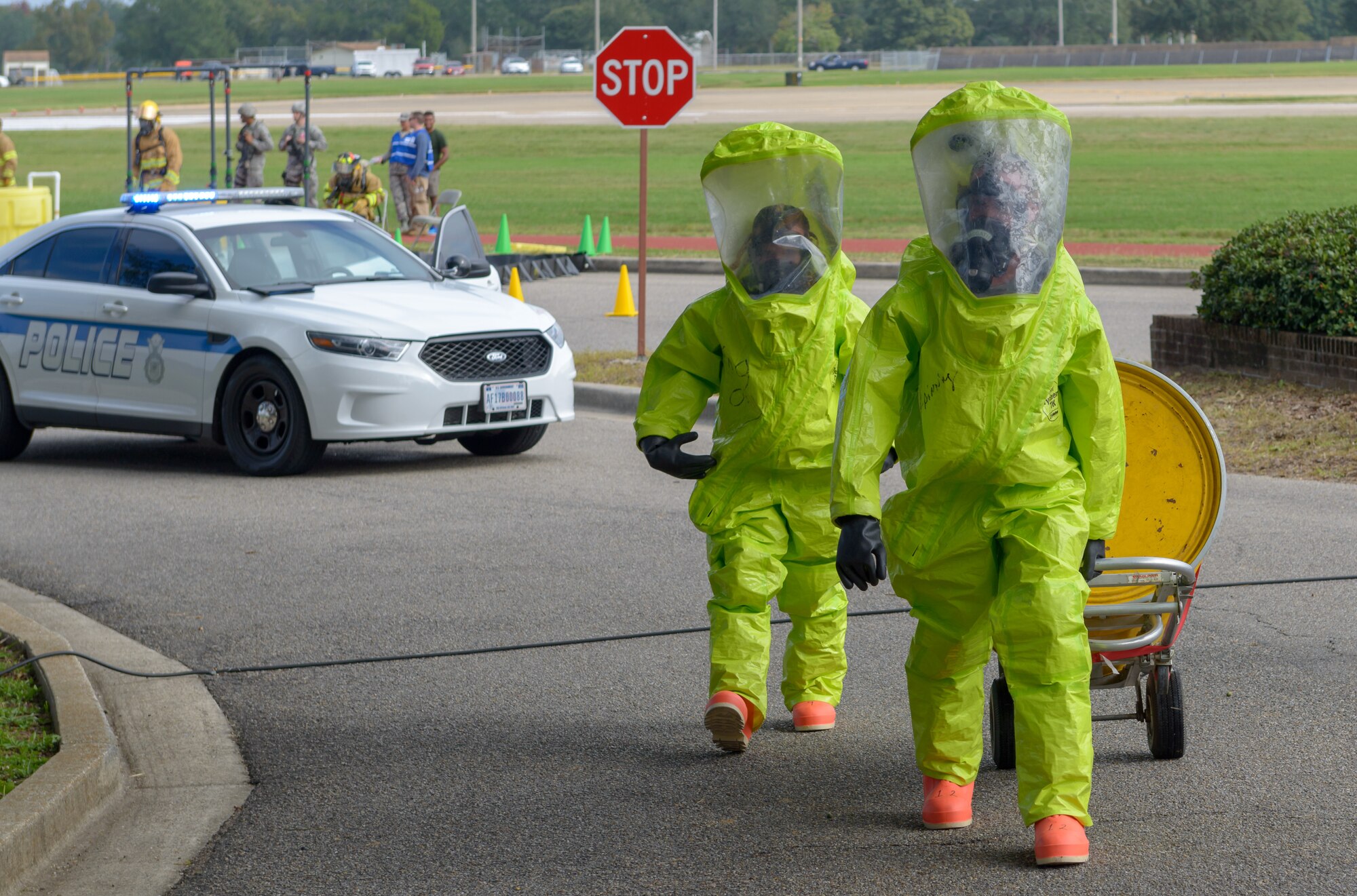 Keesler firefighters prepare to remove hazardous material during the Anti-Terrorism, Force Protection Condition and Chemical, Biological, Radiological, Nuclear and high-yield Explosives training exercise at the Marina at Keesler Air Force Base, Mississippi, Oct. 17, 2018. The AT/FPCON/CBRNE exercise was conducted to evaluate the mission readiness and security of Keesler. (U.S. Air Force photo by Andre' Askew)