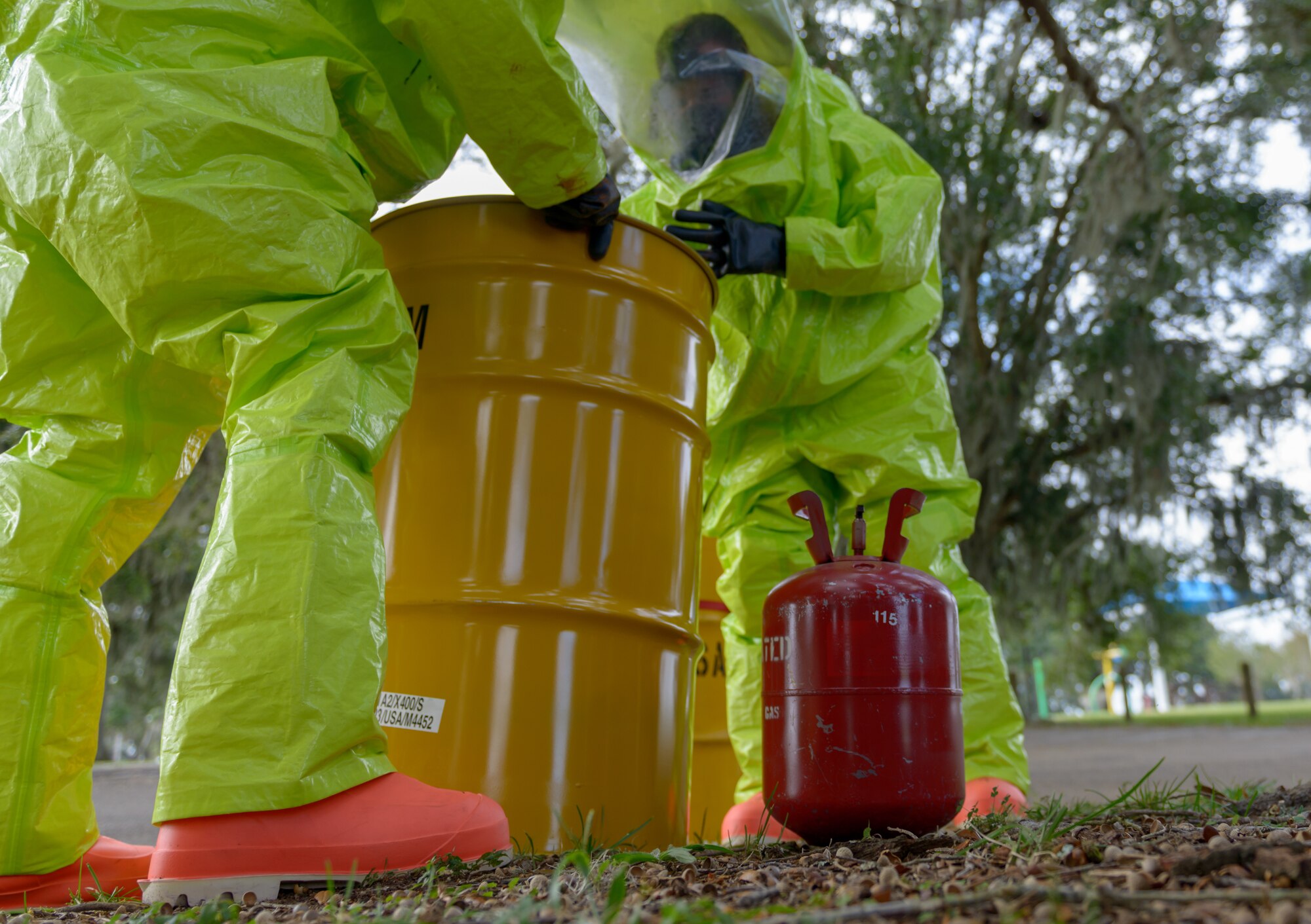 Keesler firefighters prepare to remove hazardous material during the Anti-Terrorism, Force Protection Condition and Chemical, Biological, Radiological, Nuclear and high-yield Explosives training exercise at the Marina on Keesler Air Force Base, Mississippi, Oct. 17, 2018. The AT/FPCON/CBRNE exercise was conducted to evaluate the mission readiness and security of Keesler. (U.S. Air Force photo by Andre' Askew)