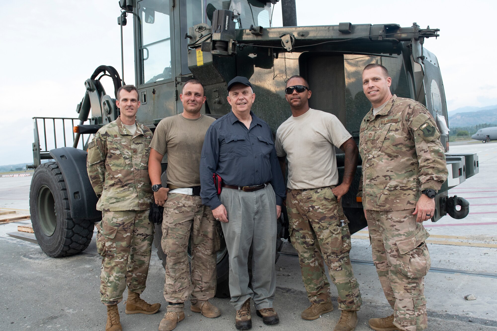 U.S. Ambassador to Indonesia, Joseph R. Donovan Jr. poses with Col. Daniel Roesch, 36th Contingency Response Group commander, Tech. Sgts. Edward Feilen, Christopher Johnson, both assigned to the 36th Mobility Response Squadron, and Chief Master Sgt. William Hebb, 36th CRG superintendent, in Palu, Indonesia Oct. 15, 2018. The purpose of Donovan’s visit was to thank 36th CRG Airmen and conduct site visits of humanitarian operations in Palu, Halim and Balikpapan. (U.S. Air Force photo by Master Sgt. JT May III)