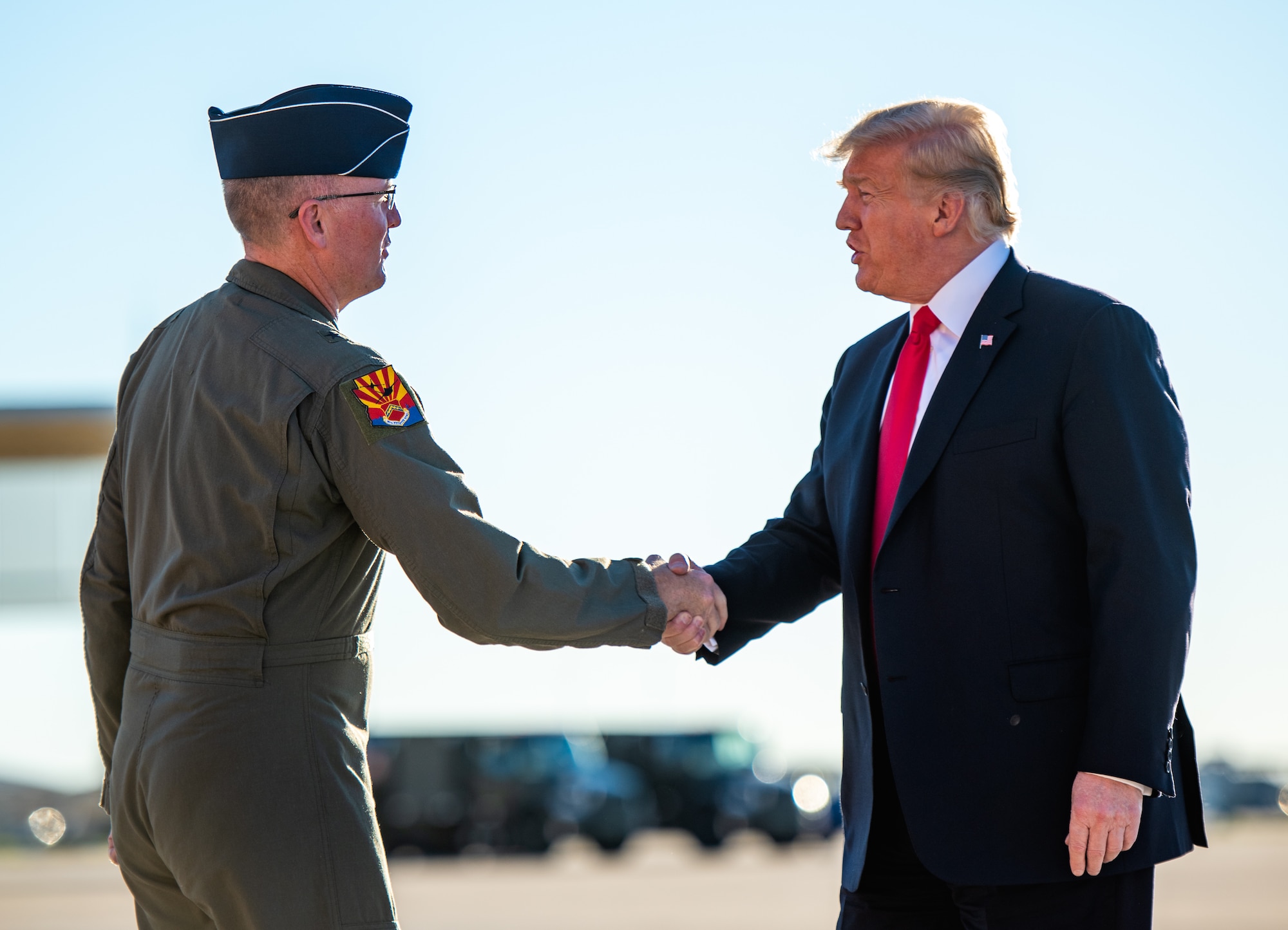 President Donald J. Trump, is greeted by Brig Gen. Todd Canterbury, 56th Fighter Wing commander at Luke Air Force Base, Ariz., Oct. 19, 2018. Additionally, Trump praised the F-35’s capabilities and the progression of its pilot training program. (U.S. Air Force photo by Senior Airman Alexander Cook)