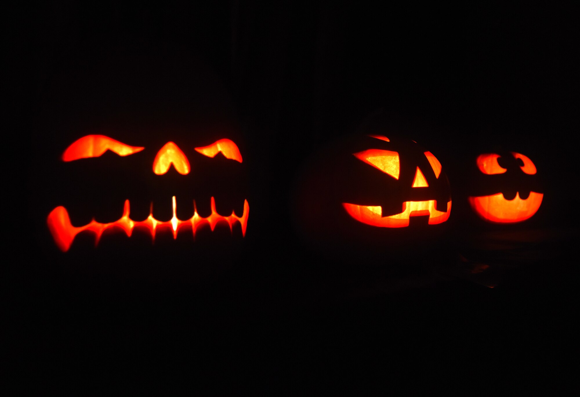 Jack-o-lanterns light up during a U.S. Air Force Hearts Apart event Oct. 18, 2018, on RAF Mildenhall, England. The 100th Civil Engineering Squadron hosted the monthly event, which helps bring Team Mildenhall families of deployed Airmen closer during times of separation. (U.S. Air Force photo by Airman 1st Class Brandon Esau)