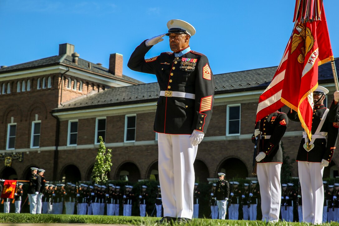 Retired U.S. Marine Corps Sgt. Maj. John L. Canley, the 298th Marine Medal of Honor recipient, renders a salute during a parade for Canley at Marine Barracks Washington D.C., Oct. 19, 2017.