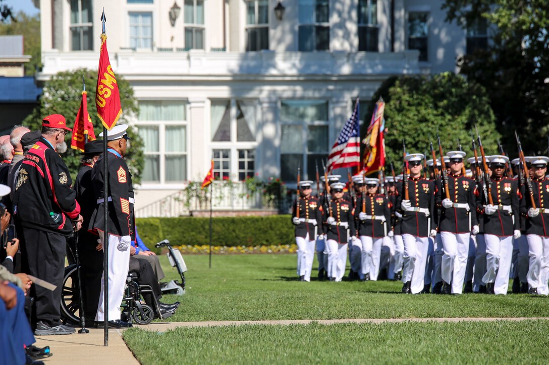 Marines with the Marine Barracks Washington D.C. marching companies conduct pass in review during a parade for retired U.S. Marine Corps Sgt. Maj. John L. Canley, the 298th Marine Medal of Honor recipient at the Barracks, Oct. 19, 2017. It is tradition for the Barracks to host a parade for Marines who are awarded the Medal of Honor, our nation’s highest and most prestigious personal military decoration. (U.S. Marine Corps photo by Cpl. Damon Mclean/Released)