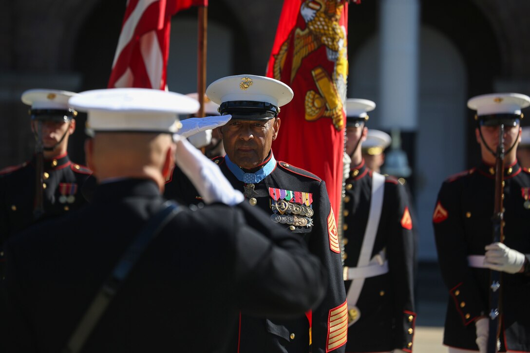 Retired U.S. Marine Corps Sgt. Maj. John L. Canley, the 298th Marine Medal of Honor recipient, renders a salute during a parade for Canley at Marine Barracks Washington D.C., Oct. 19, 2017.
