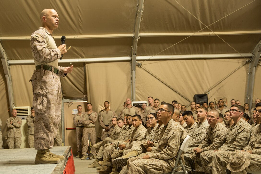 UNDISCLOSED LOCATION, SOUTHWEST ASIA - U.S. Marine Corps Col. George Schreffler, the commanding officer of Special Purpose Marine Air-Ground Task Force, Crisis Response-Central Command, speaks to Marines and Sailors during a town hall meeting October 19, 2018. During the town hall, the SPMAGTF-CR-CC Commanding Officer and Sergeant Major briefed Marines on operations in the region. (U.S. Marine Corps photo by Cpl. Teagan Fredericks)