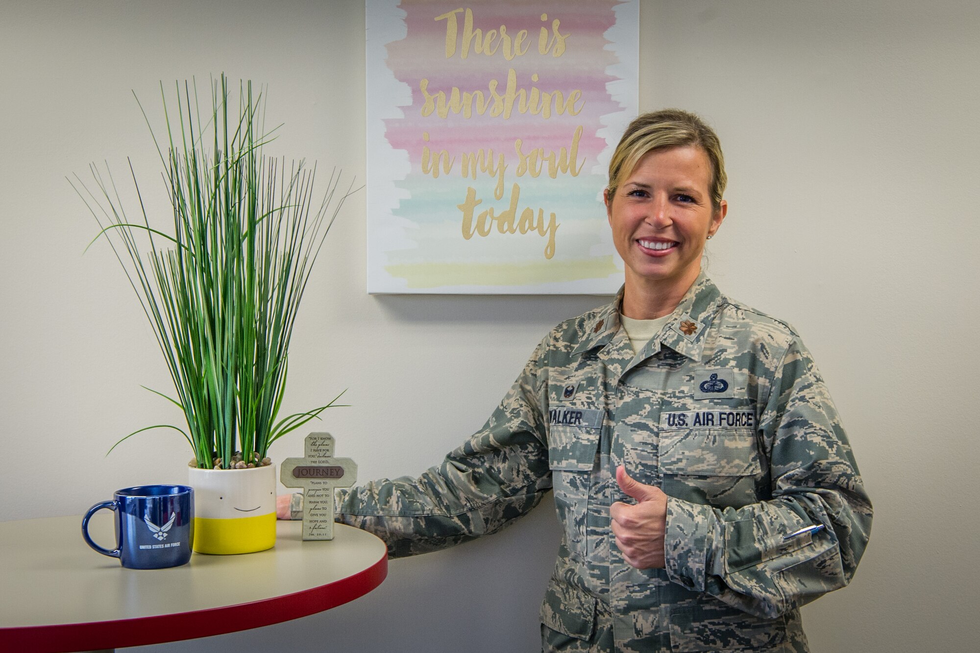 Maj. Shannon Walker, 514th Force Support Squadron commander, poses for a photo  in her office at Joint Base McGuire-Dix-Lakehurst.