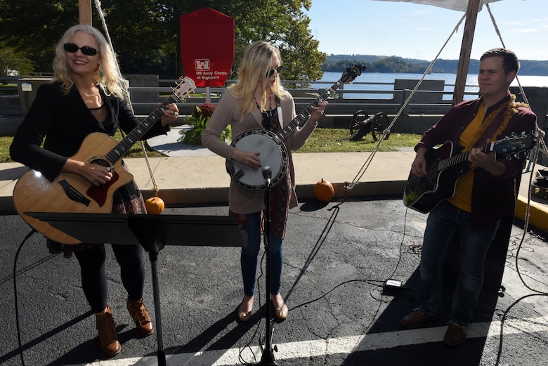 Recording Artist Delnora Reed Acuff (Left), Banjoist Brandy Miller and Guitarist Joe Dean perform music of the period of the 1940s during the 75th Anniversary Commemoration of Dale Hollow Dam and Reservoir Oct. 19, 2018. (USACE photo by Lee Roberts)