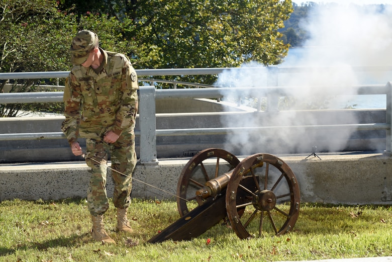 A Soldier from the 2nd Squadron of the 278th Armored Cavalry Regiment, Tennessee National Guard, shoots off the first of a three-shot volley from a cannon to dedicate Dale Hollow Dam during the 75th Anniversary Commemoration of Dale Hollow Dam and Reservoir in Celina, Tenn., Oct. 19, 2018.  Because the work to complete Dale Hollow Dam finished in 1943 during World War II, the Corps of Engineers never officially dedicated the dam, which is customary with these projects. (USACE photo by Lee Roberts)