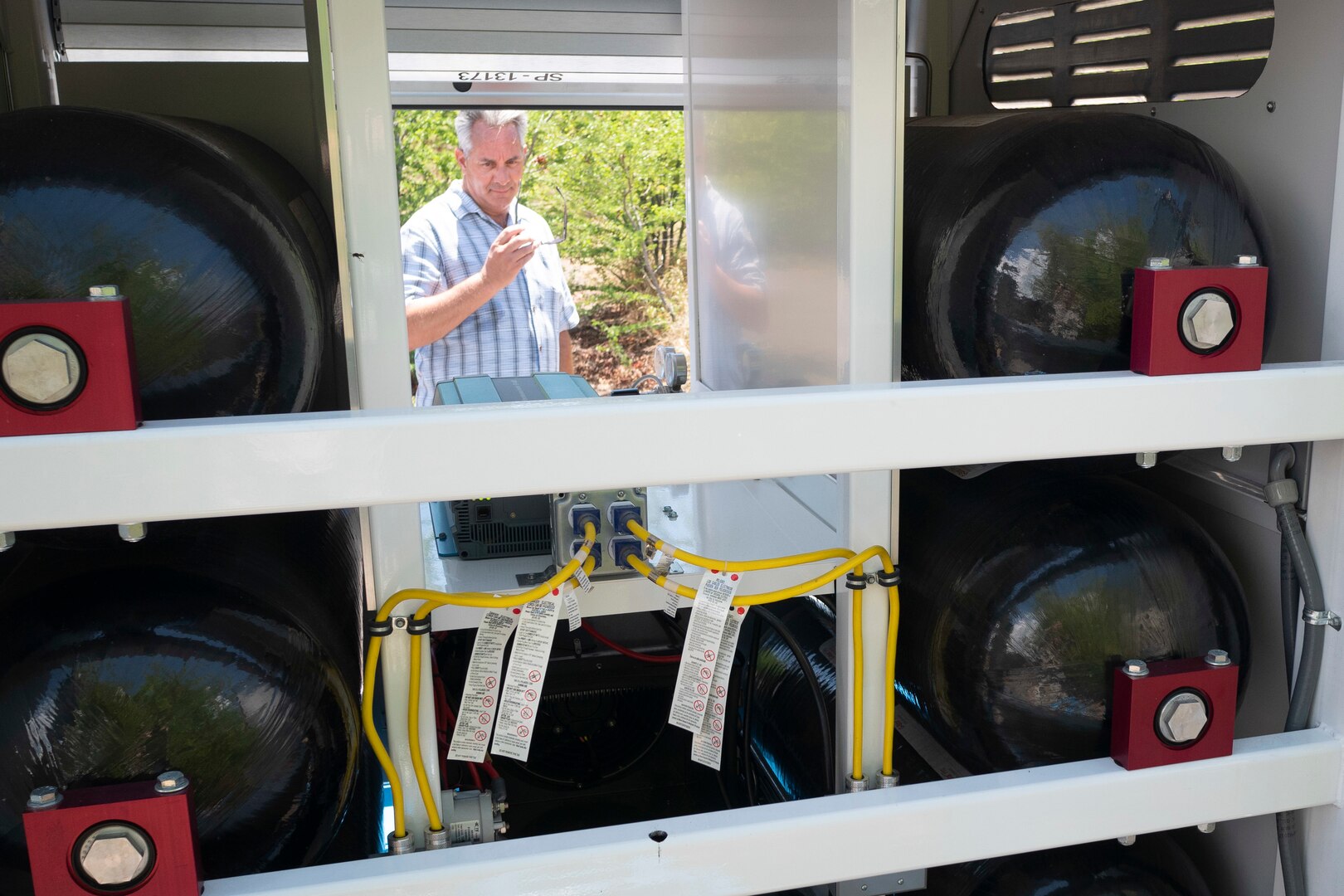 Retired Col. David Molinaro, Hawaii Center for Advanced Transportation Technologies project manager, operates a mobile, 5-kW hydrogen fuel cell generator