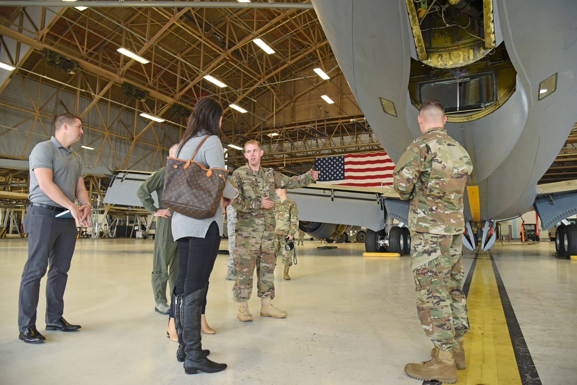 Members of the 92nd Maintenance Squadron talk with congressional staffers about the types of maintenance tasks flying crew chiefs are responsible for on the KC-135 Stratotanker during a tour Oct. 18, 2018, at Fairchild Air Force Base, Washington. The staffers represented numerous leaders in Washington D.C. including Georgia Reps. Rick Allen and Sanford Bishop, Washington state Reps. Derek Kilmer and Cathy McMorris Rodgers, and North Carolina Rep. Walter Jones. (U.S. Air Force photo/Staff Sgt. Mackenzie Mendez)