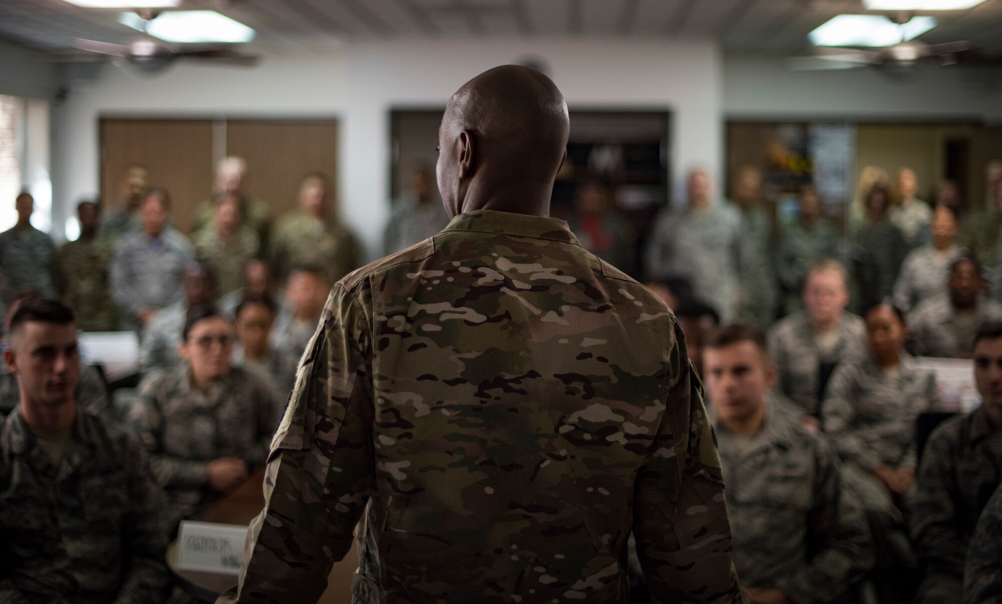 Chief Master Sgt. of the Air Force Kaleth O. Wright speaks to a group of Airmen in a First-Term Airman’s Course Oct. 19, 2018, at Nellis Air Force Base, Nevada. Airmen had the opportunity to ask questions about Air Force regulations and what to look forward to as a first-term Airman. (U.S. Air Force photo by Airman 1st Class Andrew D. Sarver)