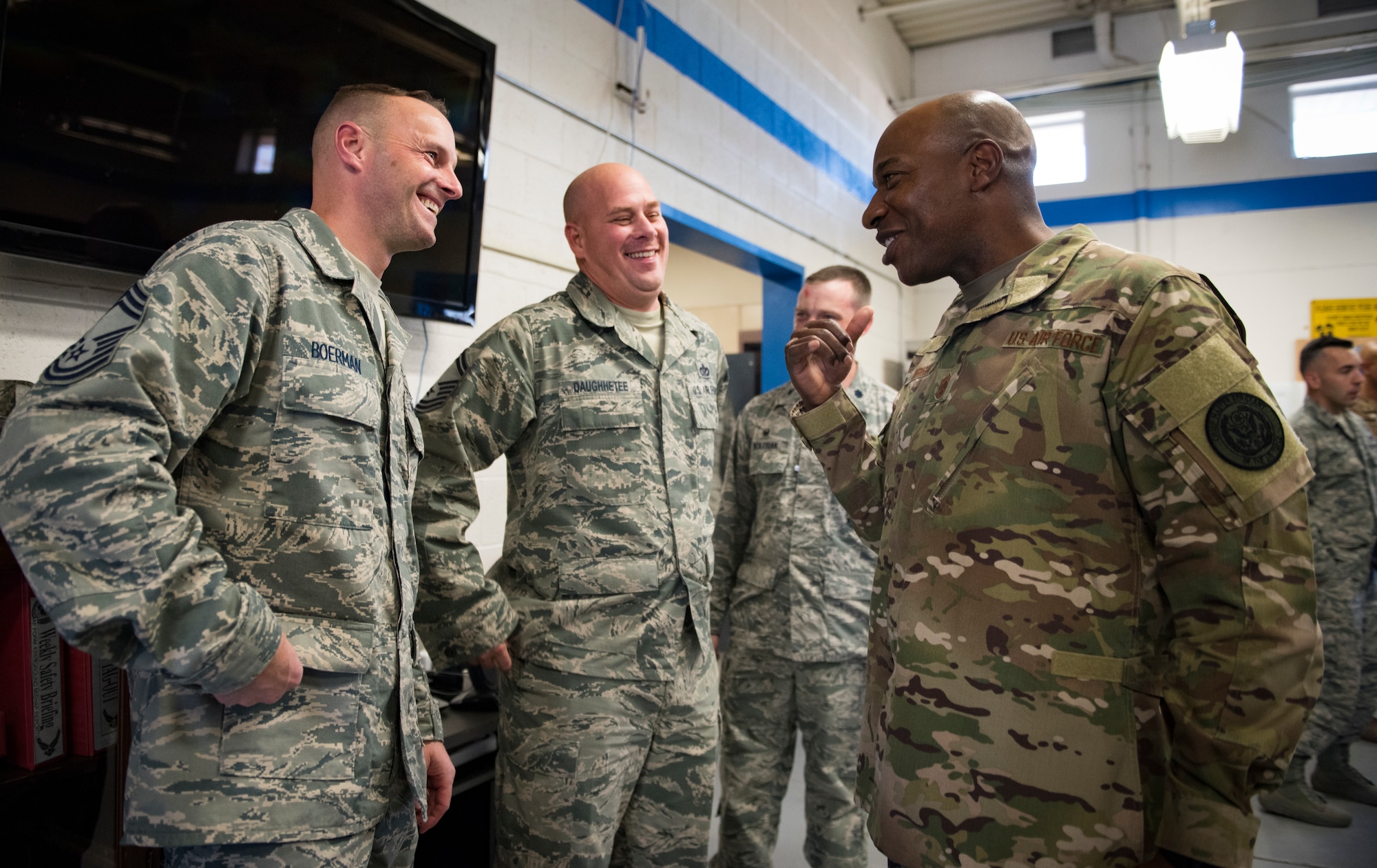 Chief Master Sgt. of the Air Force Kaleth O. Wright speaks with Chief Master Sgt. David Boerman, 99th Civil Engineer Squadron chief enlisted manager, and Senior Master Sgt. Jason Daughhetee, 99th CES engineering flight superintendent, Oct. 19, 2018, at Nellis Air Force Base, Nevada. Wright and Daughhetee were stationed together at McConnell Air Force Base, Kansas, between 2012 and 2013. (U.S. Air Force photo by Airman 1st Class Andrew D. Sarver)