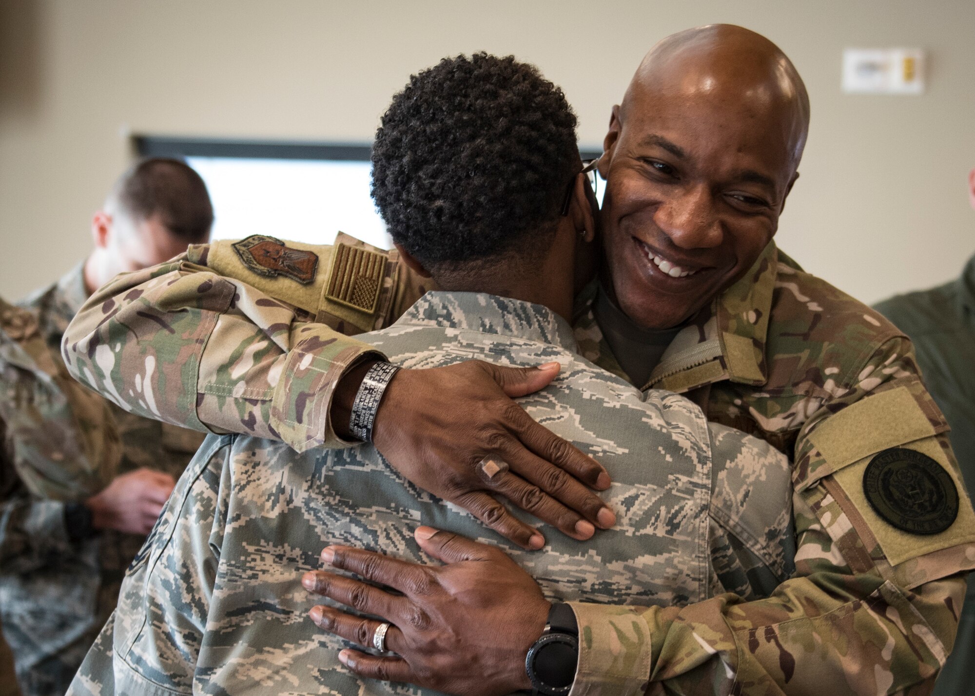 Chief Master Sgt. of the Air Force Kaleth O. Wright greets one of his former Airmen, Tech. Sgt. Amanda Taylor, 726th Operations Group command support staff superintendent, during a base tour Oct. 19, 2018 at Nellis Air Force Base, Nevada. Wright and Taylor were stationed together at Osan Air Base, South Korea, between 2007 and 2008 where they used to play basketball together. (U.S. Air Force photo by Airman 1st Class Andrew D. Sarver)