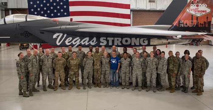 Chief Master Sgt. of the Air Force Kaleth O. Wright stands with Airmen assigned to multiple units across base Oct. 19, 2018 at Nellis Air Force Base, Nevada. Wright visited areas on base to meet Airmen and learn about what their role is at Nellis. (U.S. Air Force photo by Airman 1st Class Andrew D. Sarver)