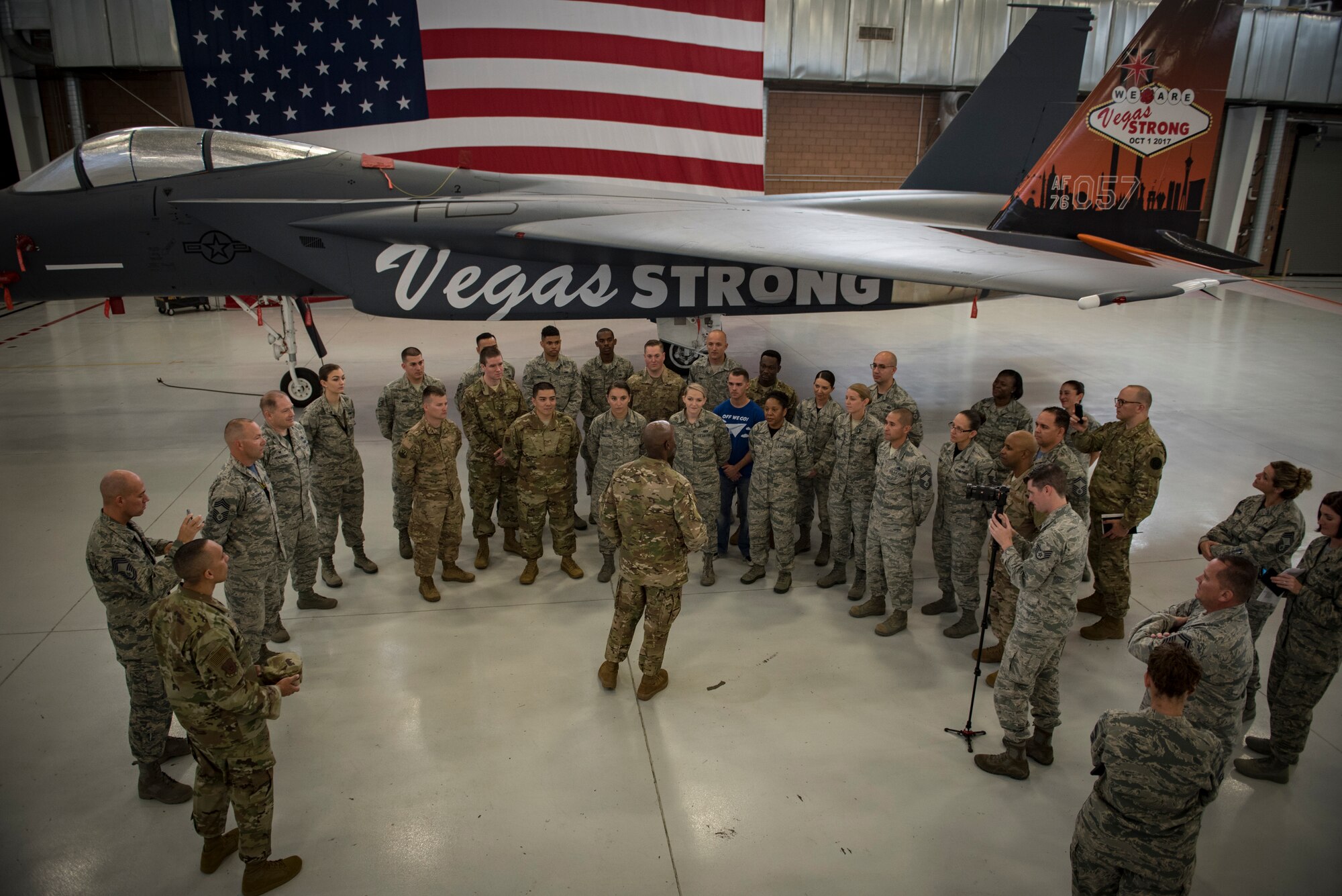 Chief Master Sgt. of the Air Force Kaleth O. Wright speaks to Airmen from multiple units across the base during a tour Oct. 19, 2018, at Nellis Air Force Base, Nevada. Wright visited areas around the base to meet Airmen and learn about what their role is at Nellis. (U.S. Air Force photo by Airman 1st Class Andrew D. Sarver)