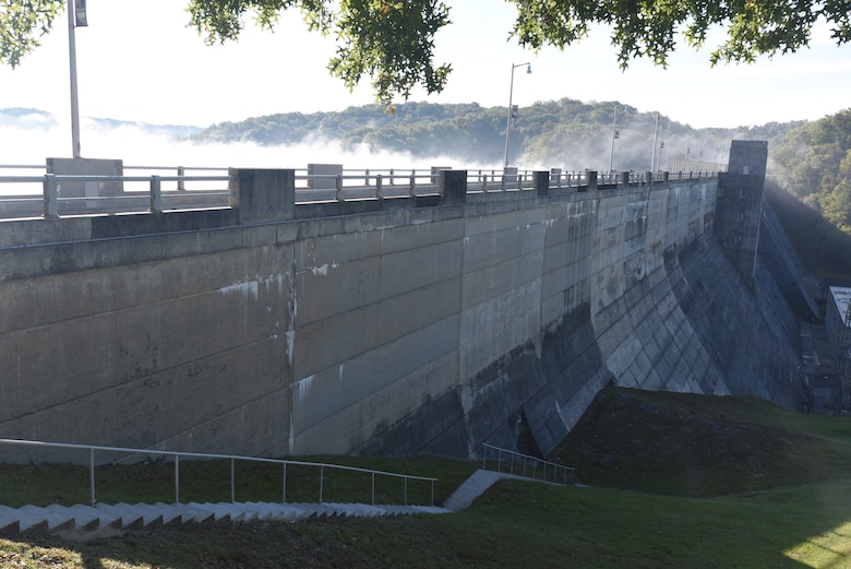 A heavy fog lifts over Dale Hollow Dam and Reservoir Oct. 19, 2018 during the 75th Anniversary Commemoration at the dam's overlook in Celina, Tenn. (USACE Photo by Lee Roberts)
