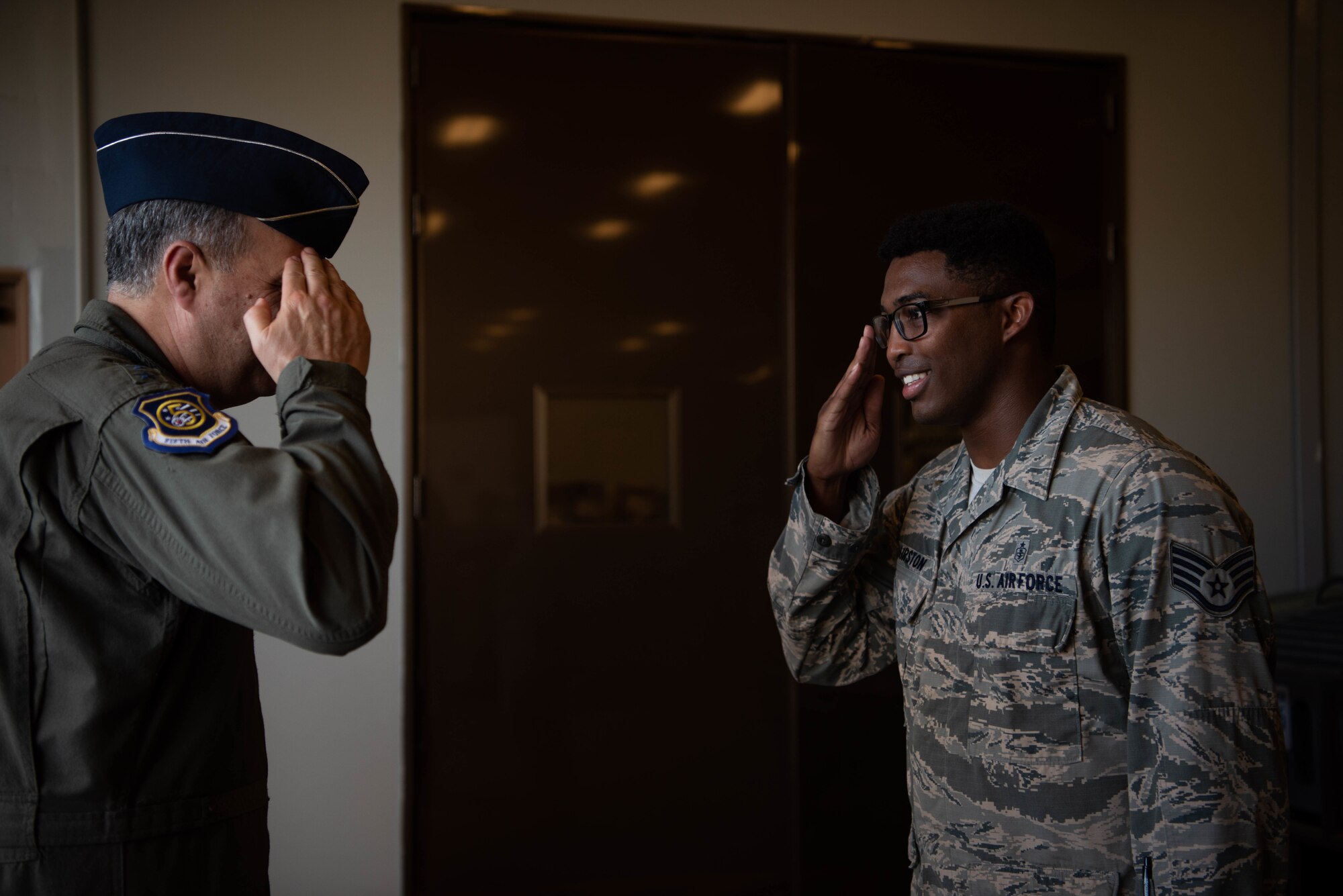 Lt. Gen. Jerry Martinez, U.S. Forces, Japan and 5th Air Force commander, observes the flight line from an air traffic control tower Oct. 16, 2018, at Kadena Air Base, Japan. Martinez visited Kadena Air Base with Chief Master Sgt. Terrence Greene, USFJ and 5th Air Force command chief, to observe the mission and engage the Airmen, spouses, and families of Team Kadena.  (U.S. Air Force photo by Senior Airman Kristan Campbell)
