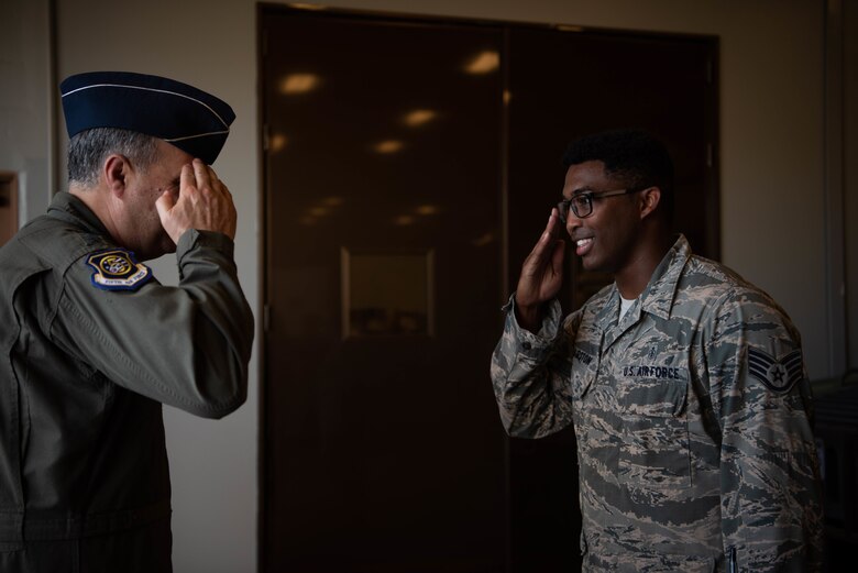 Lt. Gen. Jerry Martinez, U.S. Forces, Japan and 5th Air Force commander, observes the flight line from an air traffic control tower Oct. 16, 2018, at Kadena Air Base, Japan. Martinez visited Kadena Air Base with Chief Master Sgt. Terrence Greene, USFJ and 5th Air Force command chief, to observe the mission and engage the Airmen, spouses, and families of Team Kadena.  (U.S. Air Force photo by Senior Airman Kristan Campbell)