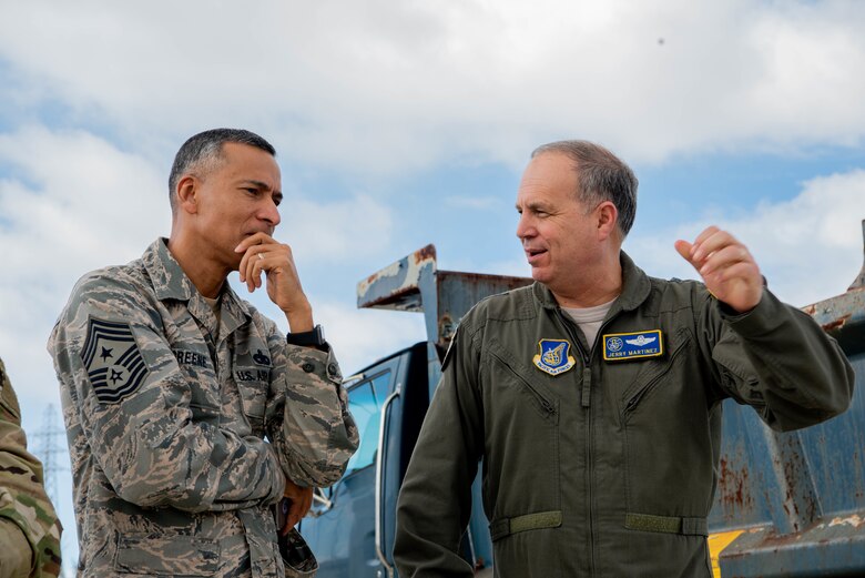 Lt. Gen. Jerry Martinez, U.S. Forces, Japan and 5th Air Force commander, observes the flight line from an air traffic control tower Oct. 16, 2018, at Kadena Air Base, Japan. Martinez visited Kadena Air Base with Chief Master Sgt. Terrence Greene, USFJ and 5th Air Force command chief, to observe the mission and engage the Airmen, spouses, and families of Team Kadena.  (U.S. Air Force photo by Senior Airman Kristan Campbell)