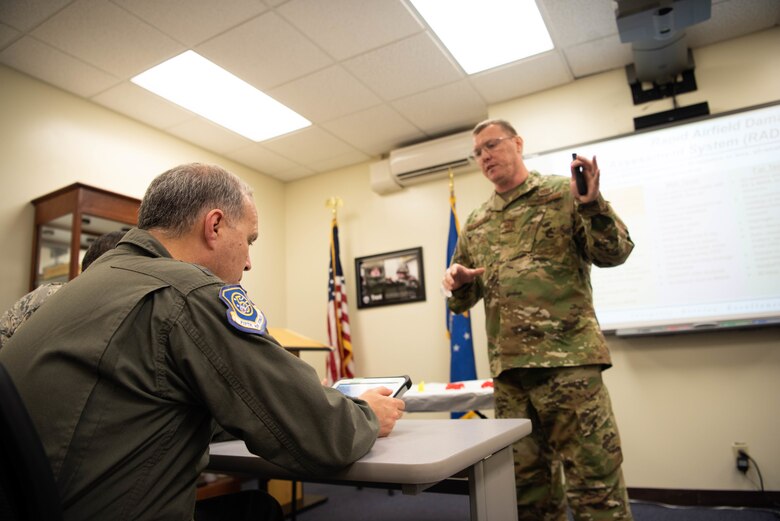 Lt. Gen. Jerry Martinez, U.S. Forces, Japan and 5th Air Force commander, observes the flight line from an air traffic control tower Oct. 16, 2018, at Kadena Air Base, Japan. Martinez visited Kadena Air Base with Chief Master Sgt. Terrence Greene, USFJ and 5th Air Force command chief, to observe the mission and engage the Airmen, spouses, and families of Team Kadena.  (U.S. Air Force photo by Senior Airman Kristan Campbell)