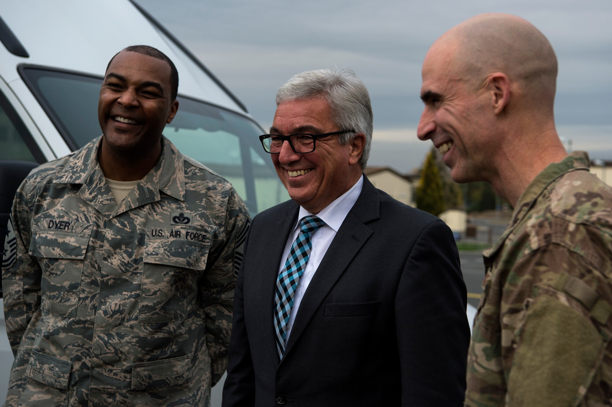 U.S. Air Force Col. Jason Bailey, 52nd Fighter Wing commander, right, and Chief Master Sgt. Alvin Dyer, 52nd FW command chief, left, speak with Roger Lewentz, Minister of the Interior of Rhineland-Palatinate, Germany, center, at Spangdahlem Air Base, Germany, Oct. 22, 2018. The department of the Ministry of the Interior is responsible for the state's communication with military forces. (U.S. Air Force photo by Airman 1st Class Valerie Seelye)
