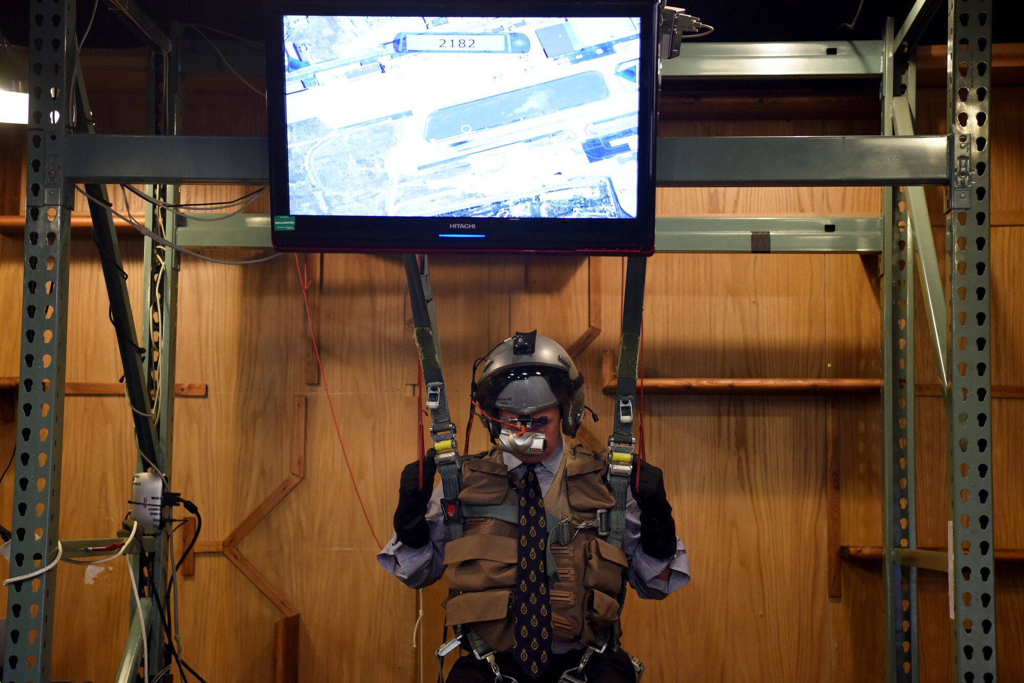 George Vestey, High Sheriff of Suffolk, checks his landing zone on a parachute training simulator at the 48th Operations Support Squadron Survival, Evasion, Resistance and Escape facility at Royal Air Force Lakenheath, England, Oct. 19, 2018. The High Sheriffs visited RAF Lakenheath for a familiarization tour, providing insight to the 48th Fighter Wing’s mission and daily operations. (U.S. Air Force Photo/ Senior Airman John A. Crawford)