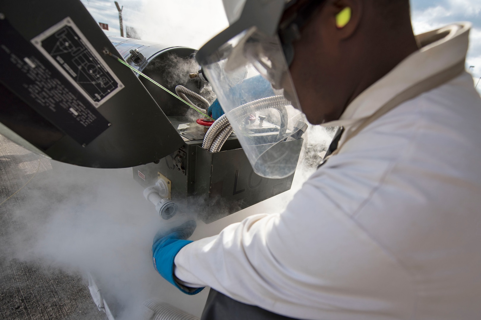 U.S. Air Force Senior Airman Kameron Ware, 100th Logistics Readiness Squadron Fuels Facilities operator, obtains a liquid oxygen sample from a LOX cart at RAF Mildenhall, England, Oct. 2, 2018. Fuels facilities Airmen ensure aircraft and government vehicles can receive fuel, maintain fuels facilities on the base, and ensure that liquid oxygen is kept at the highest level of purity. (U.S. Air Force photo by Staff Sgt. Christine Groening)