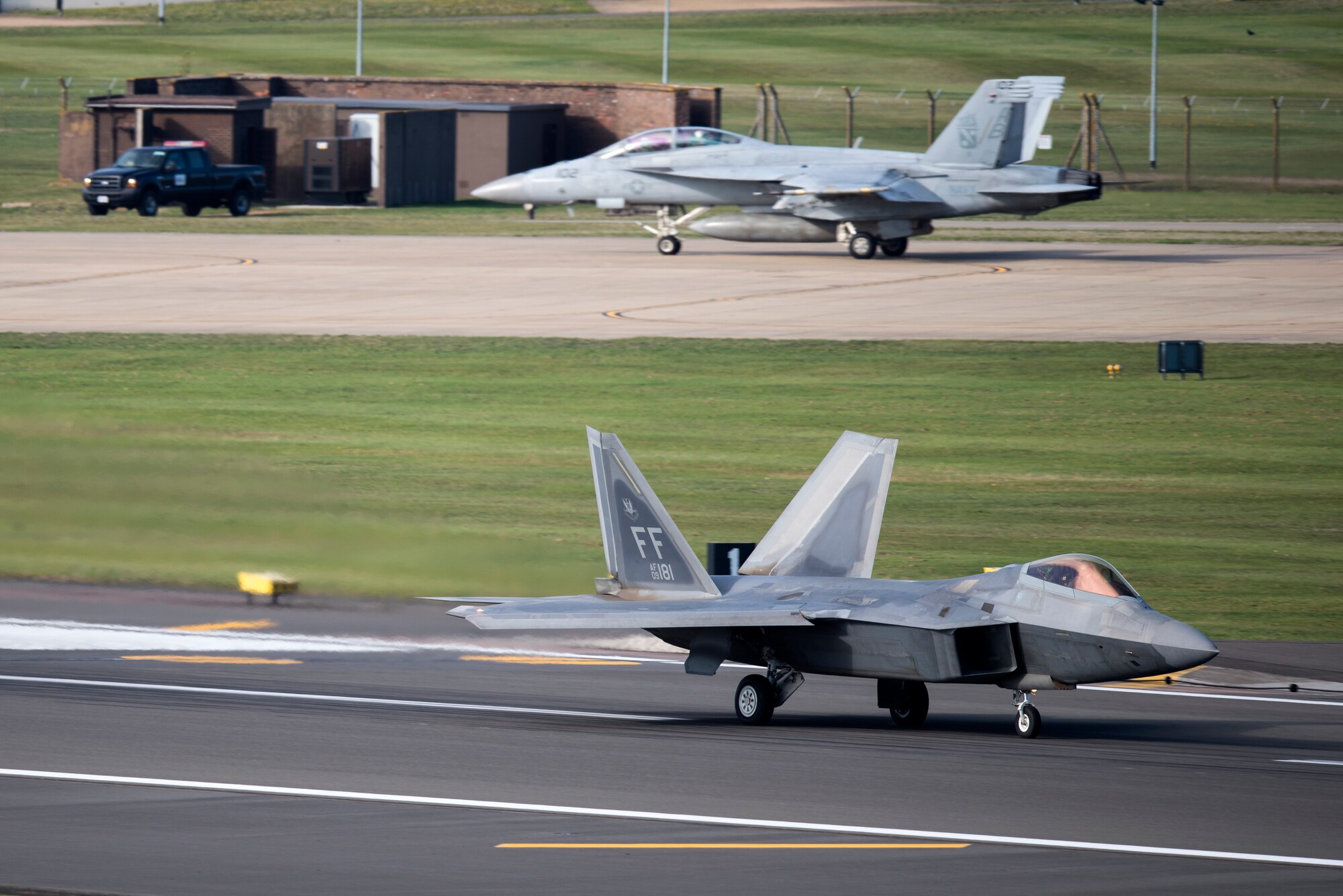An F-22 Raptor assigned to the 1st Fighter Wing, Joint Base Langley-Eustis, Va. launches for a sortie at Royal Air Force Lakenheath, England Oct. 11, 2018. The Raptors are training with U.S. allies and partners as a demonstration of U.S. commitment to European regional security. (U.S. Air Force photo/Senior Airman Malcolm Mayfield)