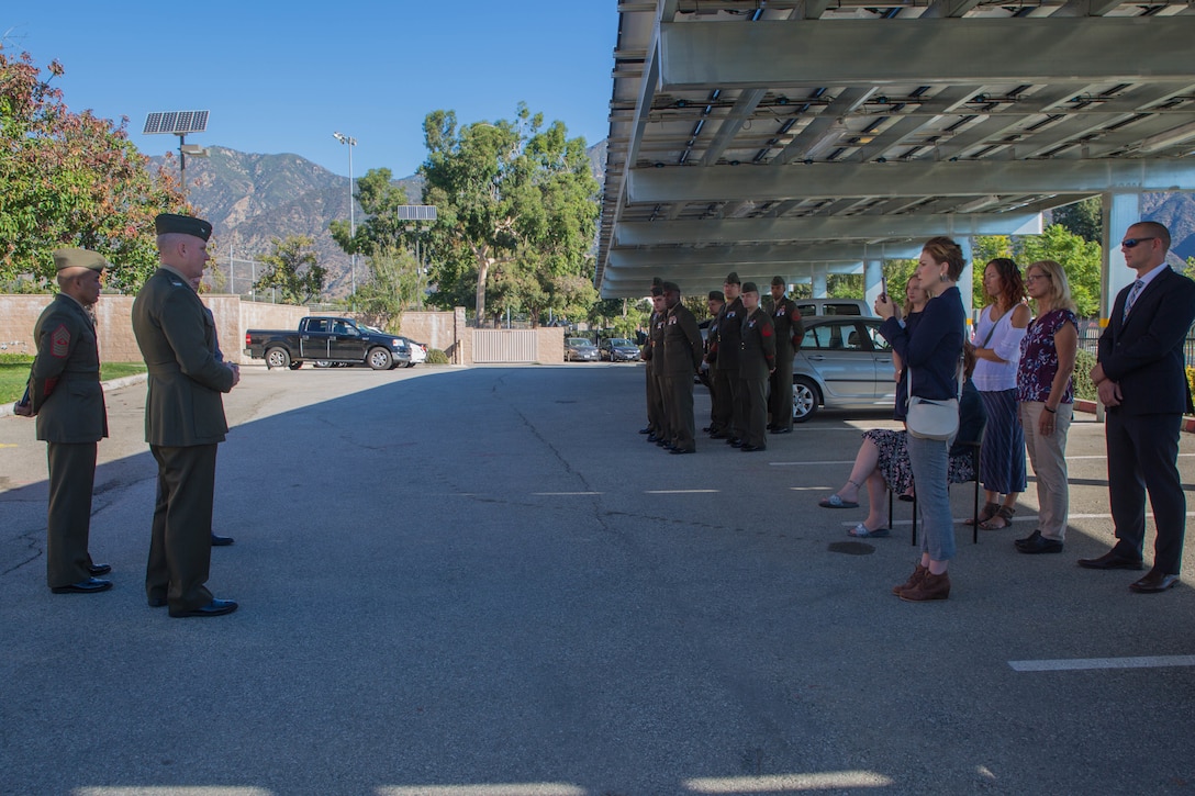 Col. Justin J. Anderson, battalion Inspector Instructor for 2nd Battalion, 23rd Marine Regiment, 4th Marine Division (center) speaks to the Marines, family and friends of Marine veteran Matthew R. Follett after he is presented with the Purple Heart in Pasadena, Calif. on October 19, 2018. SSgt Follett received the award for injuries sustained while serving as an active duty counter intelligence specialist with 3rd Battalion, 4th Marine Regiment, 1st Marine Division, on January 7, 2010. (U.S.  Marine Corps photo by Lance Cpl. Samantha Schwoch/released)