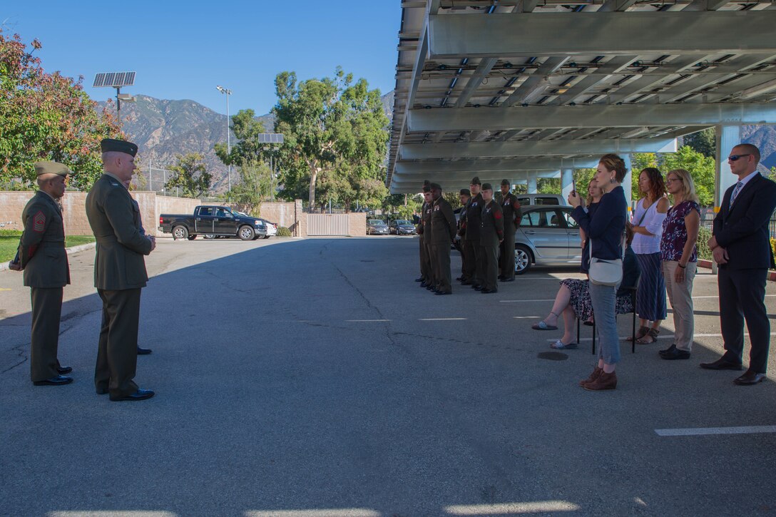 Col. Justin J. Anderson, battalion Inspector Instructor for 2nd Battalion, 23rd Marine Regiment, 4th Marine Division (center) speaks to the Marines, family and friends of Marine veteran Matthew R. Follett after he is presented with the Purple Heart in Pasadena, Calif. on October 19, 2018. SSgt Follett received the award for injuries sustained while serving as an active duty counter intelligence specialist with 3rd Battalion, 4th Marine Regiment, 1st Marine Division, on January 7, 2010. (U.S.  Marine Corps photo by Lance Cpl. Samantha Schwoch/released)