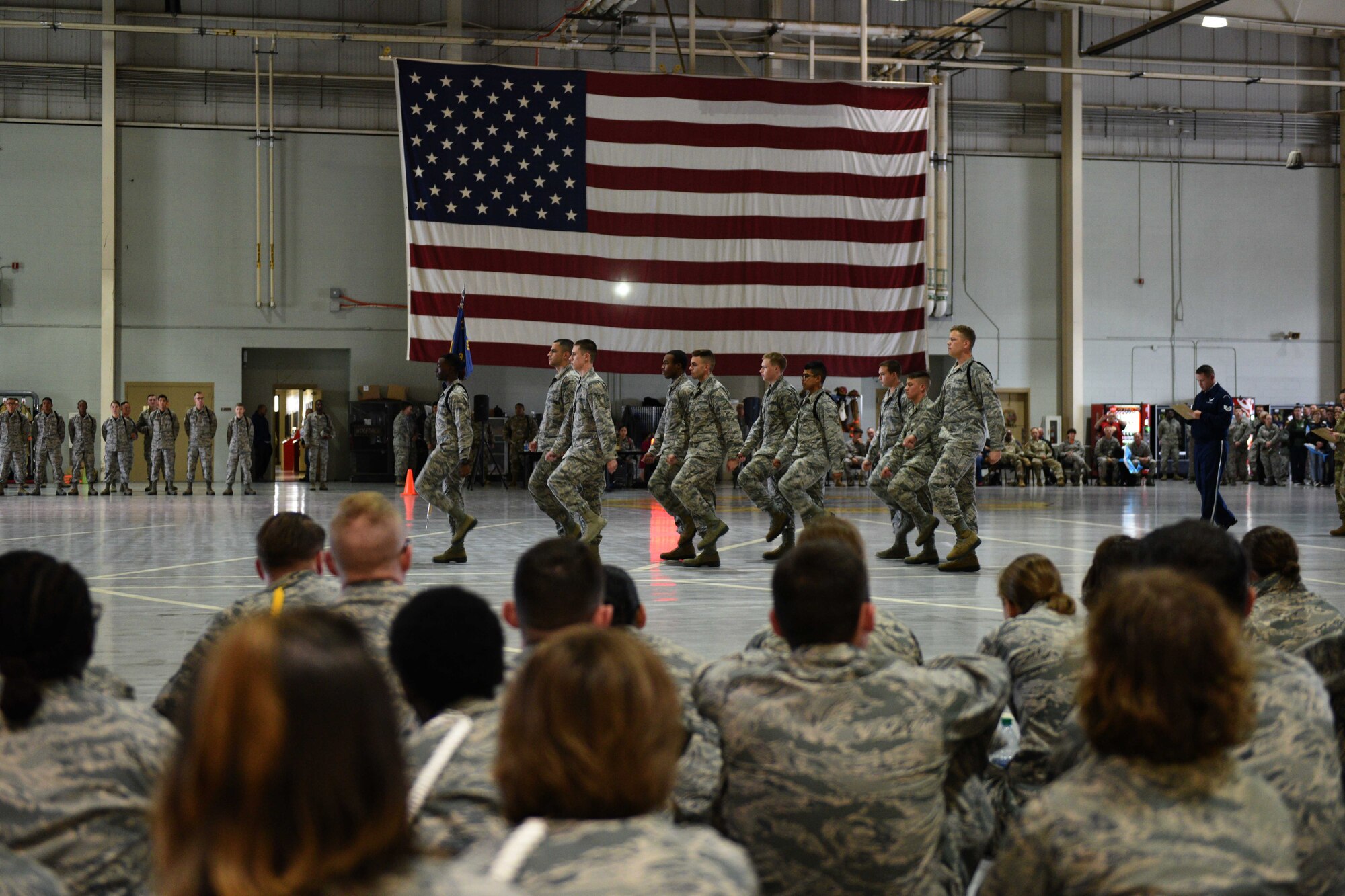 irmen from the 312th Training Squadron perform regulation drill during the quarterly drill competition at the Louis F. Garland Department of Defense Fire Academy on Goodfellow Air Force Base, Texas, Oct. 19, 2018. In regulation drill, competitors would perform standard marching maneuvers.  (U.S. Air Force photo by Senior Airman Randall Moose/Released)