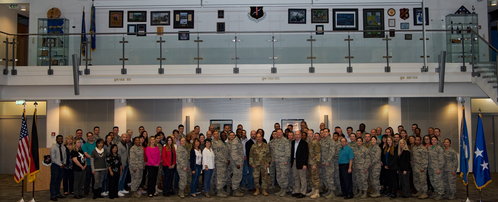 Lt. Gen. Jeffrey L. Harrigian, U.S. Air Forces in Europe and Air Forces Africa deputy commander, poses with U.S. Airmen contracting officials after applauding them for a successful fiscal year 2018 on Ramstein Air Base, Germany, Oct. 19, 2018. On a local level, contracting professionals establish contracts for supplies, equipment, services and construction to enable professional airlift for the 86th Airlift Wing and fulfill mission requirements for a host of other mission partners.