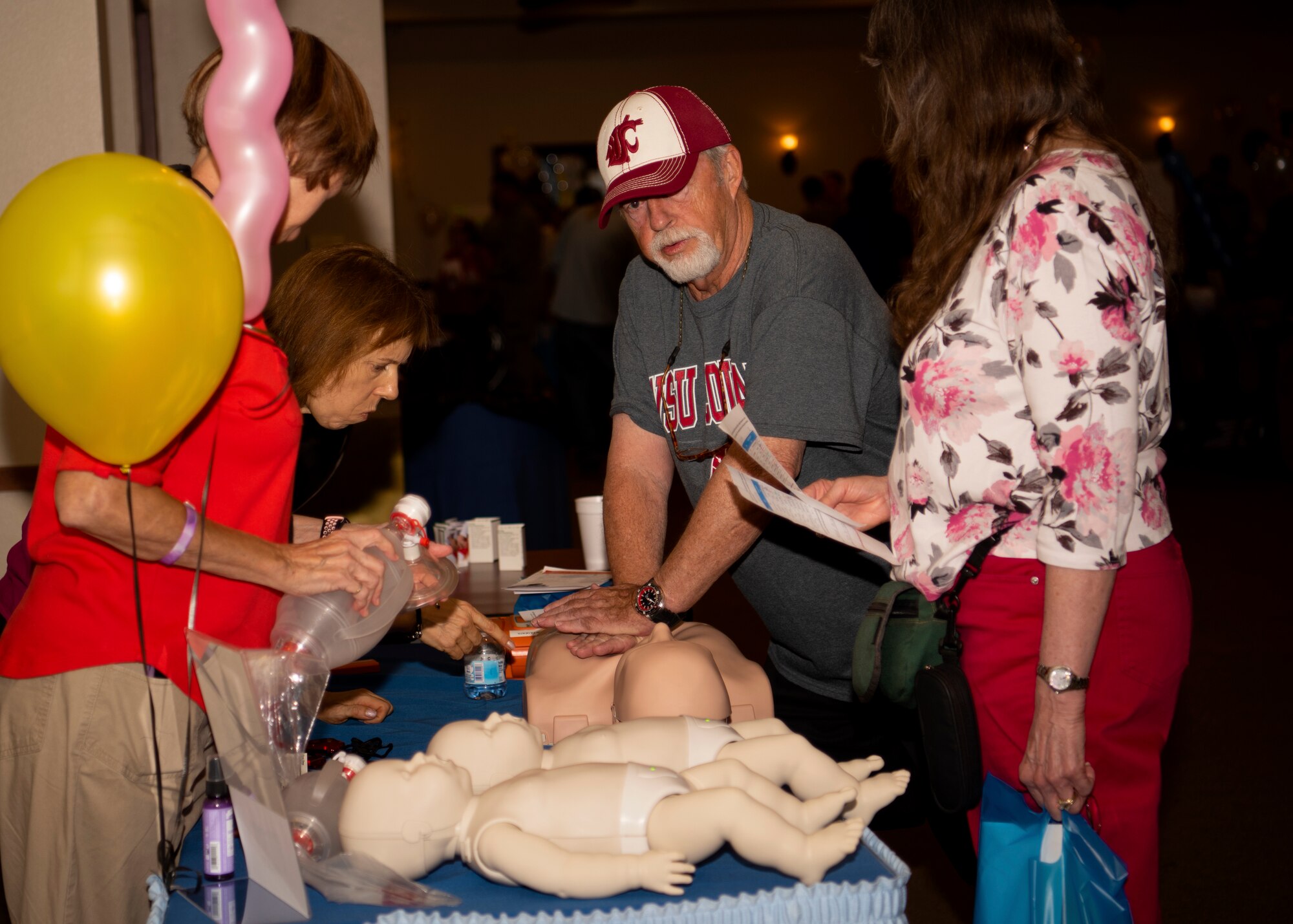 A veteran learns proper CPR procedures during the “Tune up for Health” health fair and car show, Oct. 19, 2018 at Luke Air Force Base, Ariz.