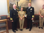 Old Salt emeritus Navy Adm. Kurt Tidd, the commander of U.S. Southern Command, left, and new Old Salt Navy Adm. Philip Davidson, the commander of U.S. Indo-Pacific Command, stand with Navy Lt. Taylor Randall, who earned her surface warfare pin aboard the cruiser USS Vella Gulf in 2016.