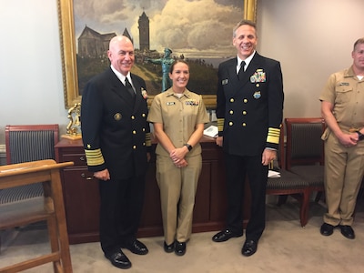 Old Salt emeritus Navy Adm. Kurt Tidd, the commander of U.S. Southern Command, left, and new Old Salt Navy Adm. Philip Davidson, the commander of U.S. Indo-Pacific Command, stand with Navy Lt. Taylor Randall, who earned her surface warfare pin aboard the cruiser USS Vella Gulf in 2016.
