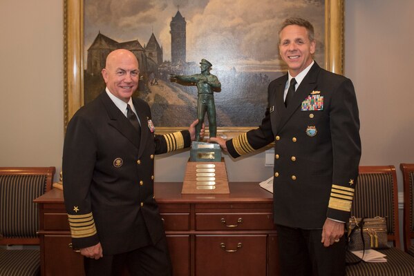 Adm. Phil Davidson, commander of U.S. Indo-Pacific Command, right, and Adm. Kurt W. Tidd, commander of U.S. Southern Command, pose with the Old Salt Award.