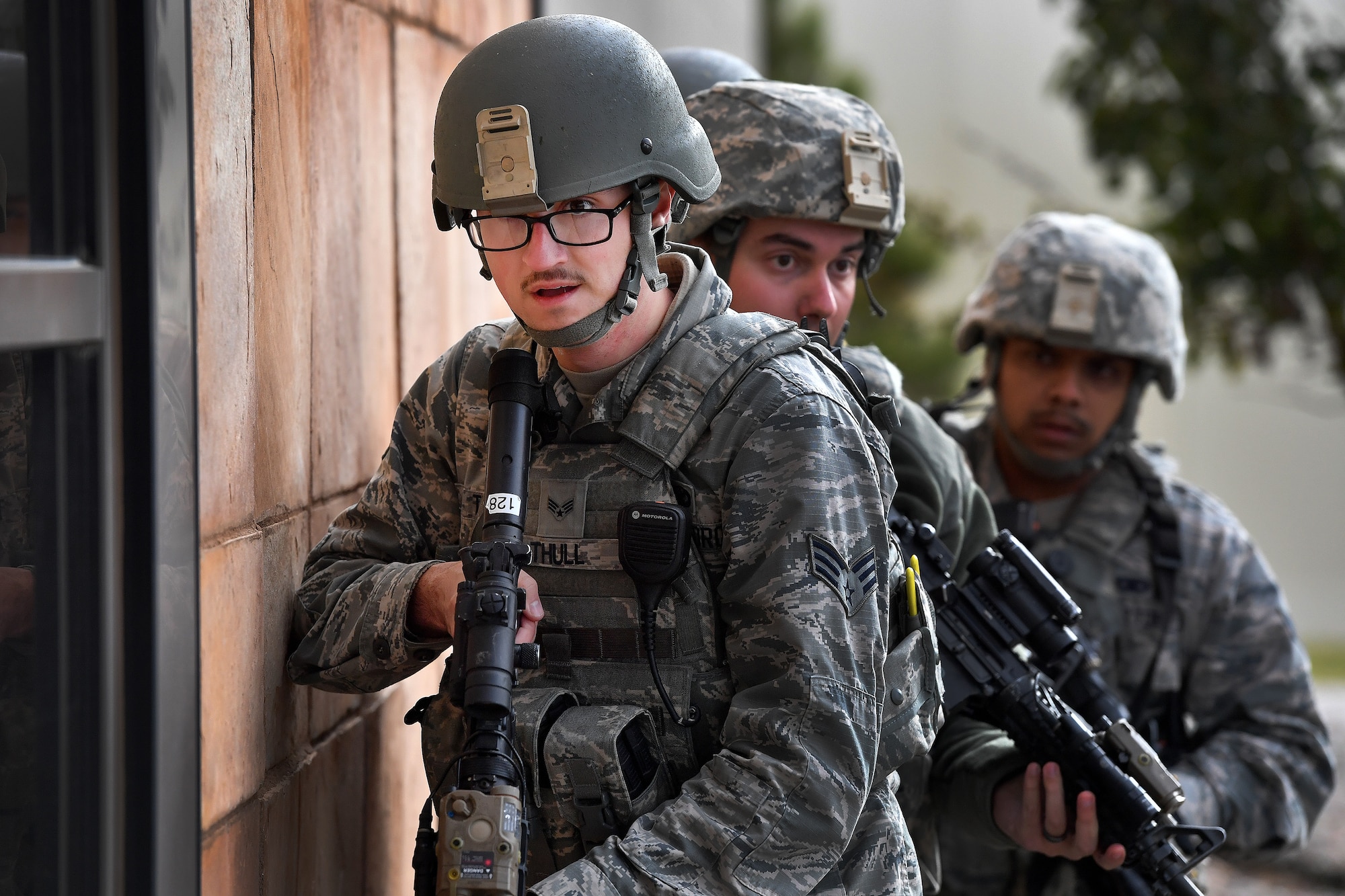 50th Security Forces Squadron patrolmen prepare to enter and clear the fitness center during Opinicus Vista 18-2 at Schriever Air Force Base, Colorado, Oct. 17, 2018. The exercise was held to test and evaluate the readiness and emergency response capabilities of the installation. (U.S. Air Force Photo by Dennis Rogers)