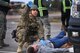 Staff Sgt. Luis Ramirez, 50th Security Forces Squadron patrolman, provides support following an exercise for Opinicus Vista 18-2 at the fitness center at Schriever Air Force Base, Colorado, Oct. 17, 2018.  Ramirez and other 50th SFS Airmen were tested in their response and ability to address a crisis. (U.S. Air Force Photo by Dennis Rogers)