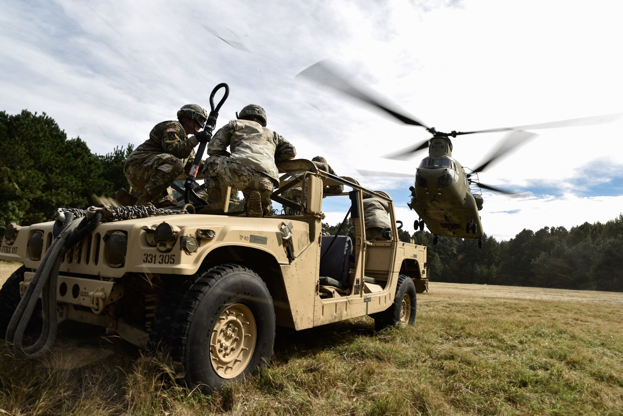 U.S. Army Soldiers from the 11th Transportation Battalion, 7th Transportation Brigade (Expeditionary), conduct sling load operations during a training exercise at Joint Base Langley-Eustis, Virginia, Oct. 17, 2018.