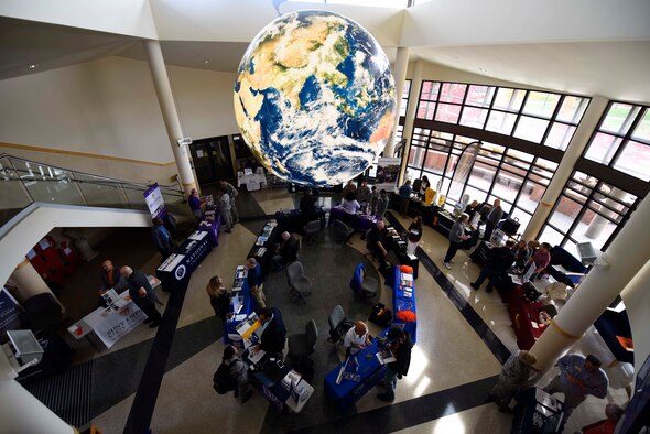 Collegiate booths are displayed as part of the 2018 Fairchild Air Force Base Education Fair at Fairchild Air Force Base, Washington, Oct. 18, 2018. Fairchild's Education Center hosts this event annually, allowing Airmen to learn about and explore different educational opportunities to further their success. (U.S. Air Force phot/Airman 1st Class Lawrence Sena)