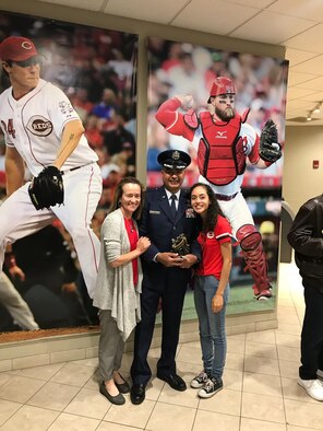 Cincinnati, OH--Maj. Pedro Munoz, Global Information Exploitation Squadron, an Air Force Reserve Individual Mobile Augmentee with the National Air and Space Intelligence Center Information Exploitation Squadron as well as senior analyst with the Space and Missile Forces Group as a Department of Defense civilian, poses for a picture during a Cincinnati Reds Major League Baseball game September 28, 2018. Munoz was recognized as a Hometown Hero by the MLB organization. (Curtesy Photo)