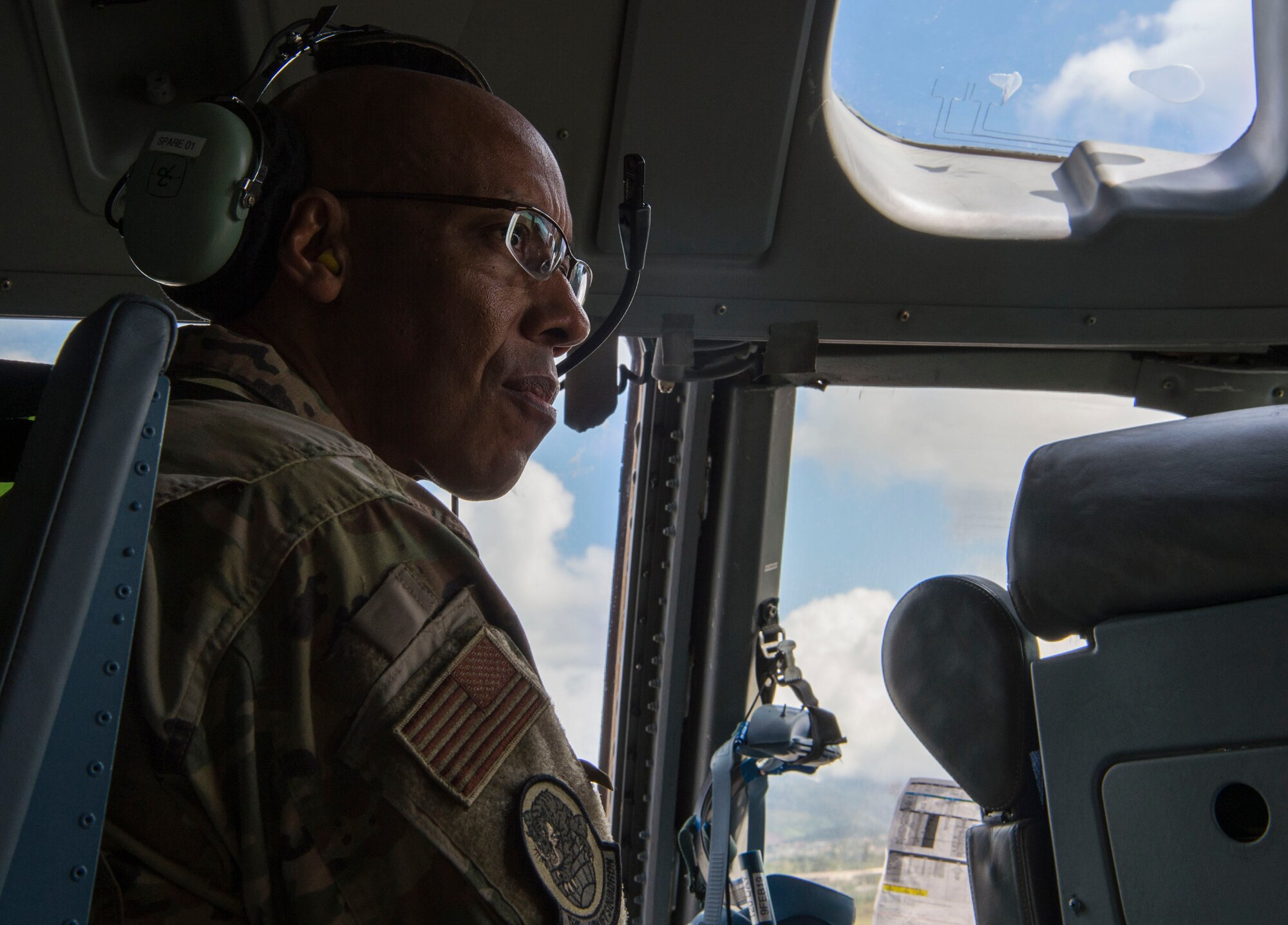 Gen. CQ Brown Jr., Pacific Air Forces commander, prepares for a cargo air drop mission on a C-17 Globemaster III, during his visit to the 15th Wing, Joint Base Pearl Harbor-Hickam, Hawaii, Oct. 19, 2018.  During his visit, Brown discussed innovation and total force integration with Airmen throughout the 15th Wing, the gateway of the Indo-Pacific. (U.S. Air Force photo by Tech. Sgt. Heather Redman)
