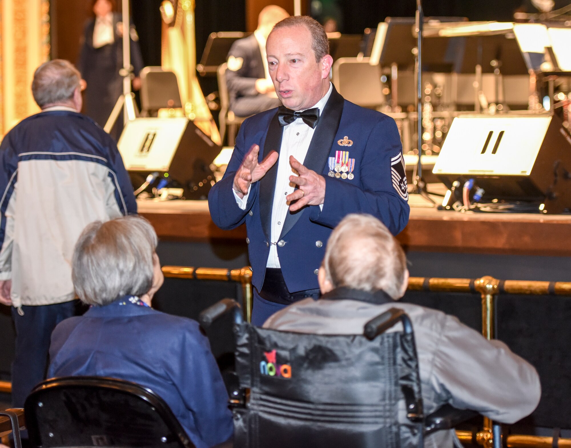 U.S. Air Force Senior Master Sgt. Jay Heltzer, Air Force Concert Band premier bandsman, speaks to members of the audience about the mission and purpose of the Air Force Band at the Murphey Performance Hall in San Angelo, Texas, Oct. 22, 2018. The mission of the Air Force Band is to honor those who served, inspire American citizens to heightened patriotism and service, and positively impact the community on behalf of the Air Force and United States of America. (U.S. Air Force photo by Aryn Lockhart/Released)