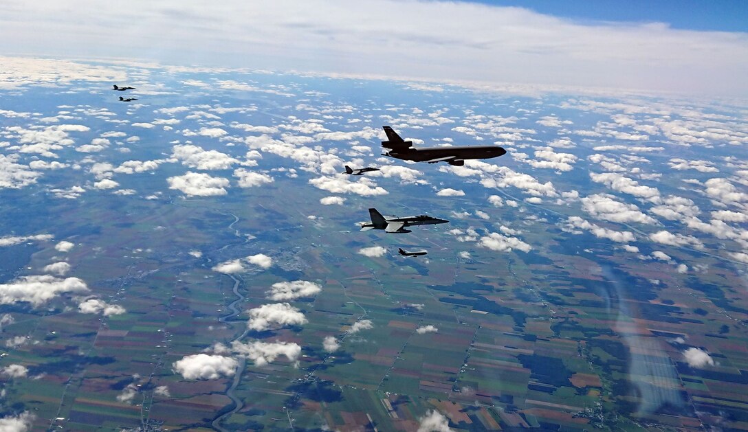 U.S. Air Force and Finnish air force aircraft fly together in Oct. 2018, on the way to Eielson Air Force Base, Alaska to participate in RED FLAG-Alaska 19-1. RF-A 19-1 is the first RED FLAG exercise the Finnish air force has participated in. (Courtesy photo from the Finnish air force)