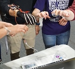 Students work on an air-keyboard project at a Bitcamp hackathon at the University of Maryland College Park.