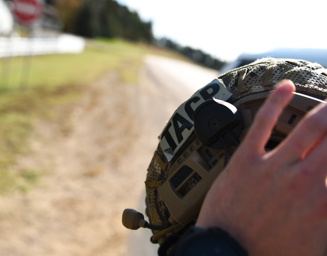 Senior Airman Steven, a 5th Air Support Operations Squadron joint terminal attack controller, puts a helmet on in Belle Fourche, S.D., Oct. 17, 2018. JTACs from Joint Base Lewis-McChord, Wash., participated in Combat Raider 19-1, an exercise hosted by the 28th Bomb Wing, to train with bombers from all 8th Air Force bases. (U.S. Air Force photo by Airman 1st Class Thomas Karol)