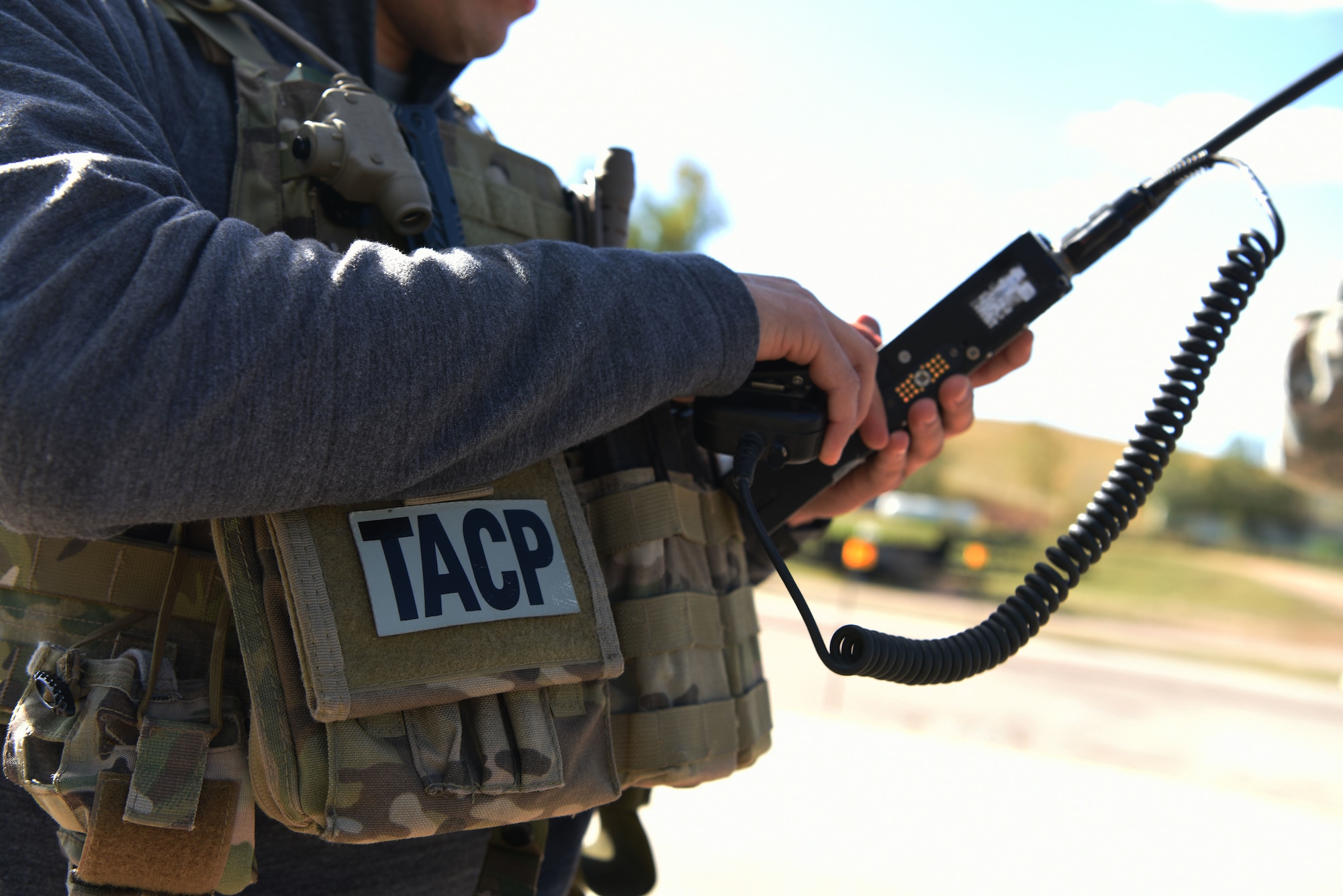 Senior Airman Thomas, a 5th Air Support Operations Squadron joint terminal attack controller, turns a radio to the correct frequency in Belle Fourche, S.D., Oct. 17, 2018. JTACs from Joint Base Lewis-McChord, Wash., participated in Combat Raider 19-1, an exercise hosted by the 28th Bomb Wing, to train with bombers from all 8th Air Force bases. (U.S. Air Force photo by Airman 1st Class Thomas Karol)