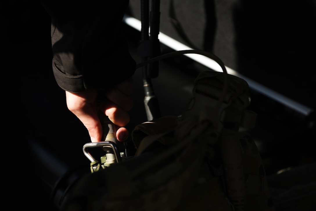 Senior Airman Thomas, a 5th Air Support Operations Squadron joint terminal attack controller, turns on a radio in Belle Fourche, S.D., Oct. 17, 2018. JTACs from Joint Base Lewis-McChord, Wash., participated in Combat Raider 19-1, an exercise hosted by the 28th Bomb Wing, to train with bombers from all 8th Air Force bases. (U.S. Air Force photo by Airman 1st Class Thomas Karol)